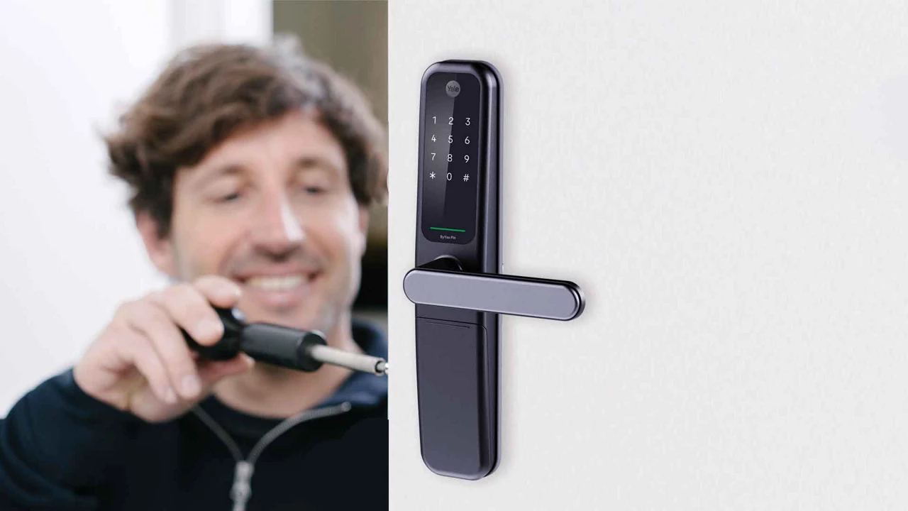 Modern smart doorbell and lock installation on a front door